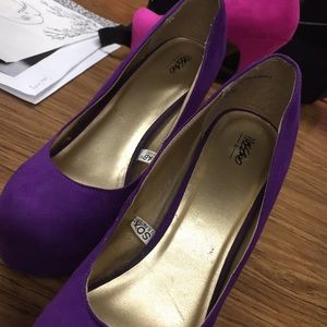 Used purple high heels
